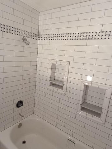 New Tub, Tile, And Plumbing